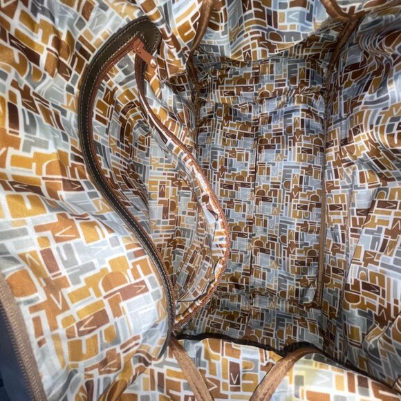 Diane Von Furstenberg Women’s Bronze Faux Leather Handles Rolling Duffel Bag - Picture 9 of 13